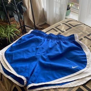 BLUE AND WHITE NIKE DRI FIT RUNNING SHORTS